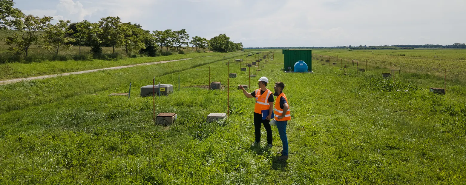 two biologists speak at the Dogaletto site