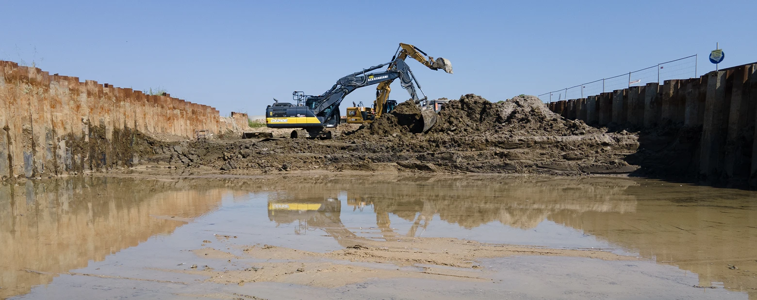bulldozers dig in the ground at the Legnago site